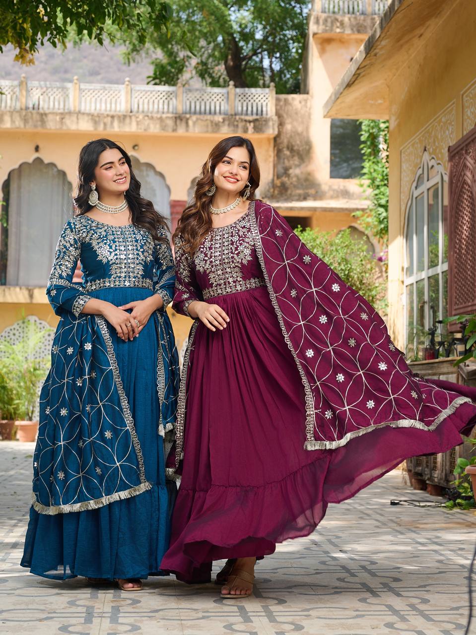 "Wine Purple Embroidered Anarkali Gown with Net Dupatta – Graceful Ethnic Wear for Festive & Wedding Celebrations"