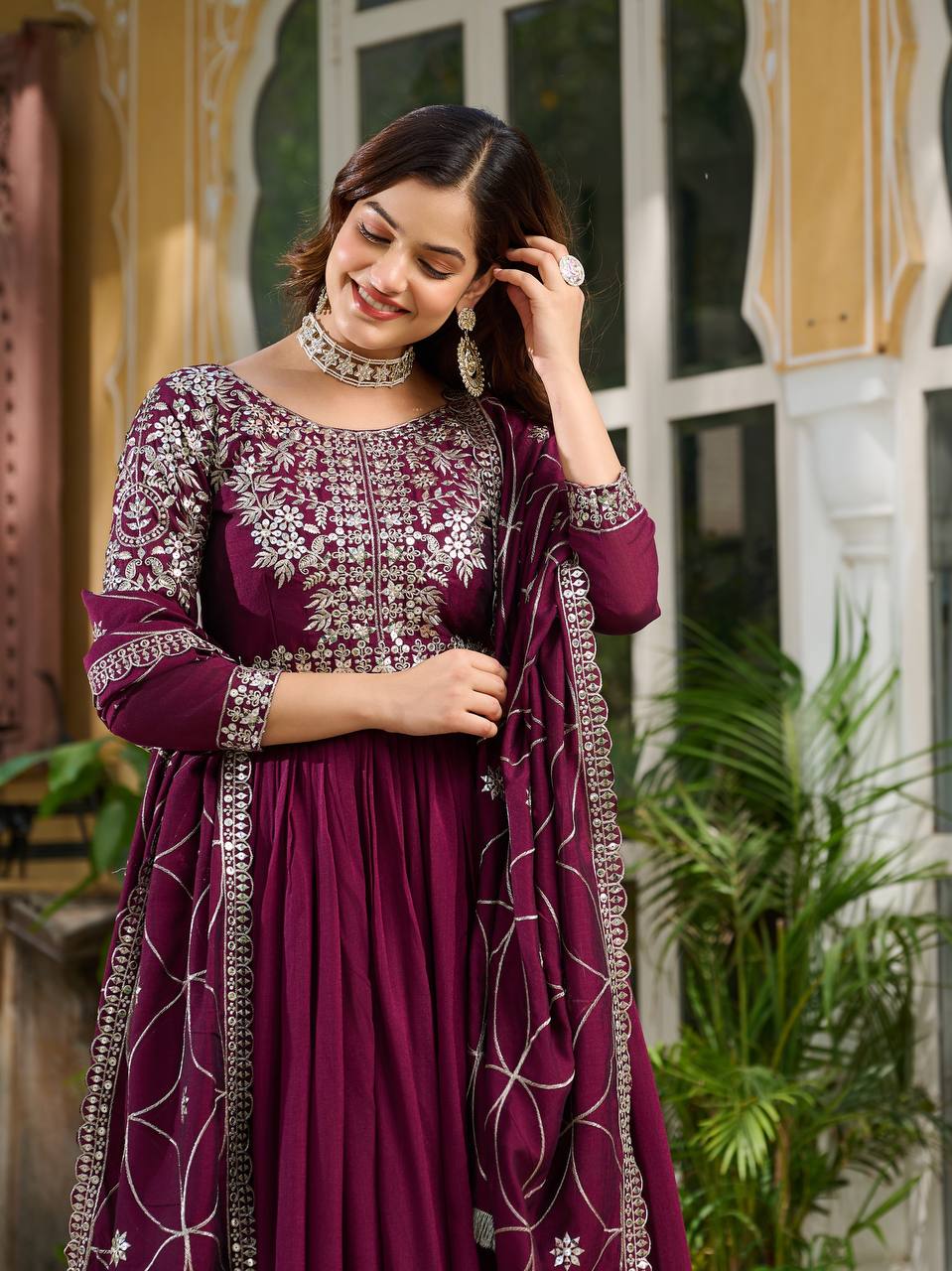 "Wine Purple Embroidered Anarkali Gown with Net Dupatta – Graceful Ethnic Wear for Festive & Wedding Celebrations"